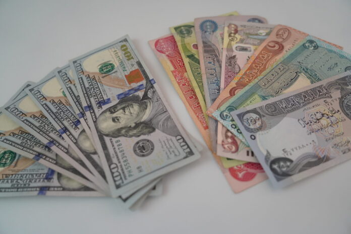 Two Key Factors Behind the Iraqi Dinar’s Decline Against the US Dollar