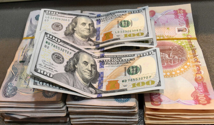 Dinar Falls Sharply as 100 Dollars Exceeds 156,000 Dinars